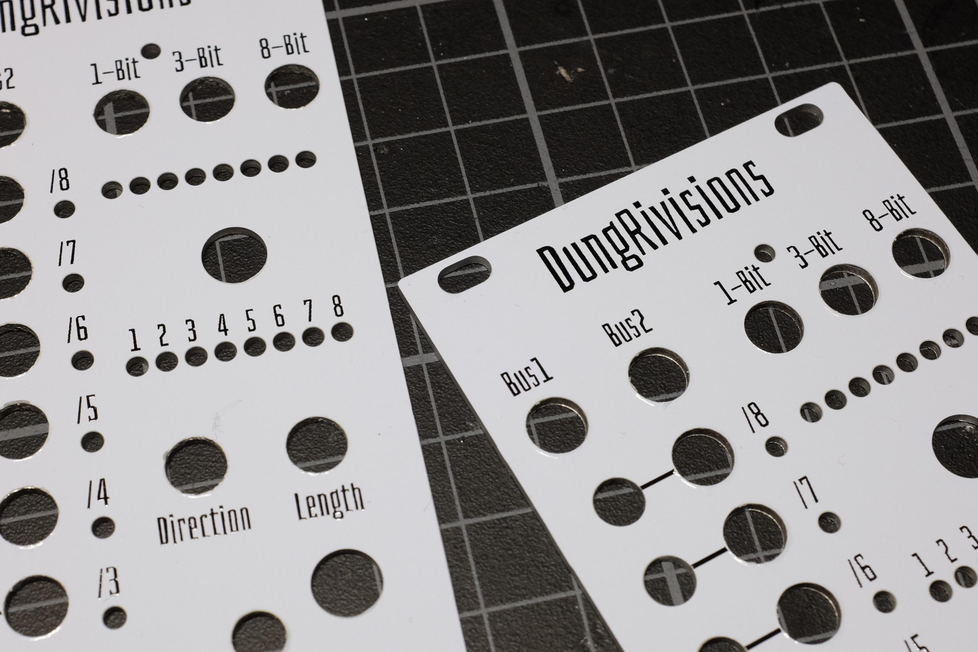 A zoomed display of two front panels highlighting bores and silkscreen printed text